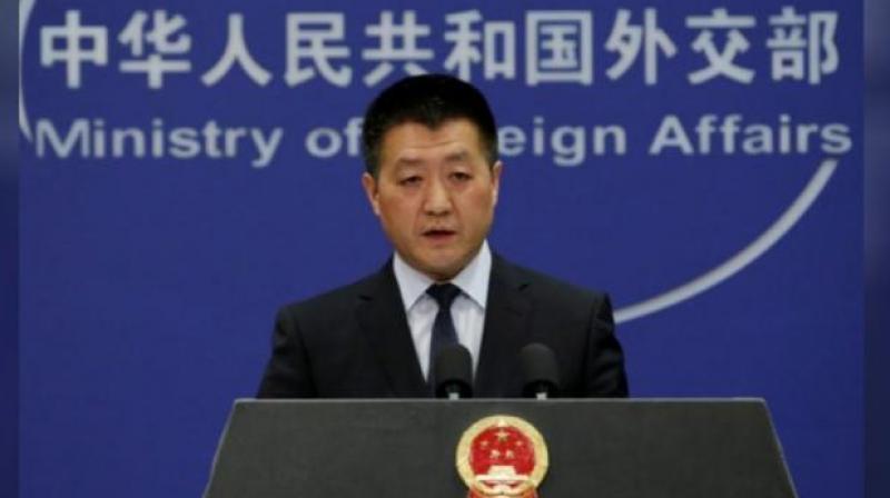 China urges India and Pakistan on Tuesday to 