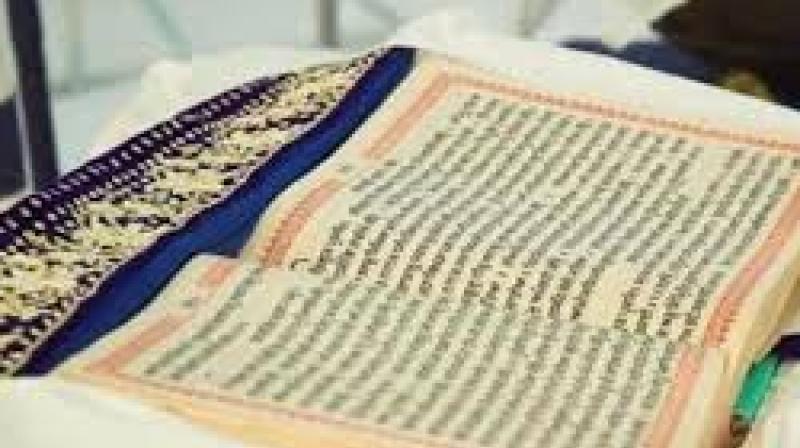 Guru Granth Sahib - File Photo Guru Granth Sahib - File Photo