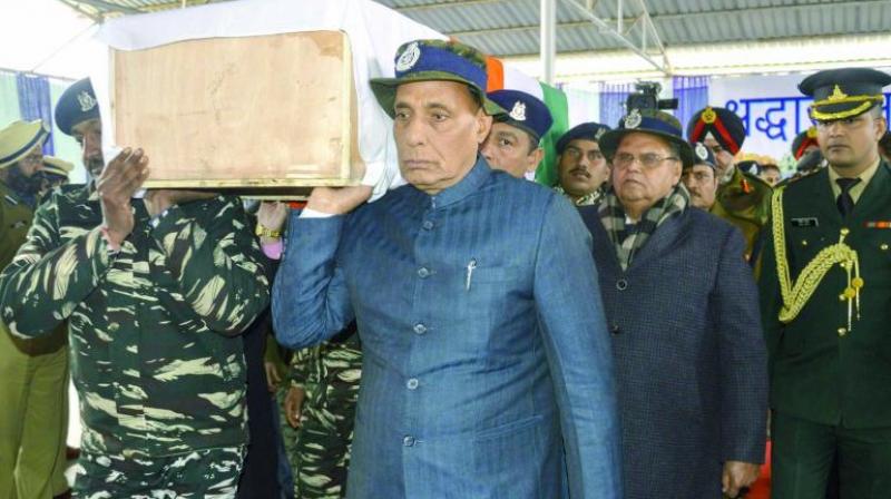 Home Minister gave shoulder to martyrs Home Minister gave shoulder to martyrs