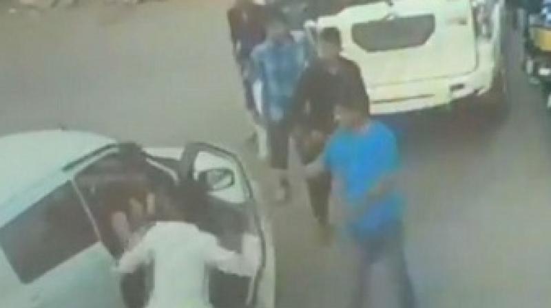 BJP MLA's son beating Man BJP MLA's son beating Man