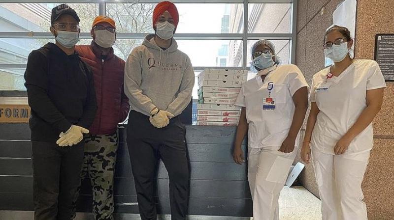 Sikh community members deliver pizzas to New York’s frontline workers