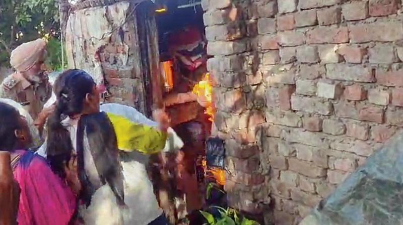 Opposing civic body action, two brothers set themselves ablaze Opposing civic body action, two brothers set themselves ablaze