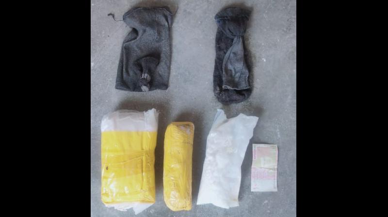 Heroin and Currency note recovered Heroin and Currency note recovered