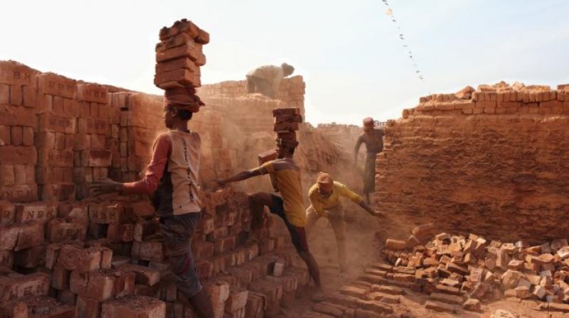 With 1.1 crore under forced labour, India tops nations driving people to 'modern slavery': Report With 1.1 crore under forced labour, India tops nations driving people to 'modern slavery': Report