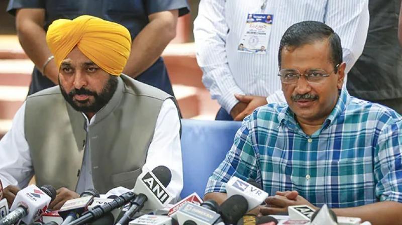 CM Bhagwant Mann and Arvind Kejriwal (file)