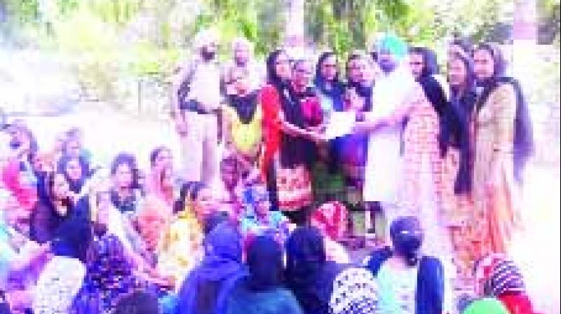 Anganwadi workers, helpers  hunger strike at the Congress ministers' house