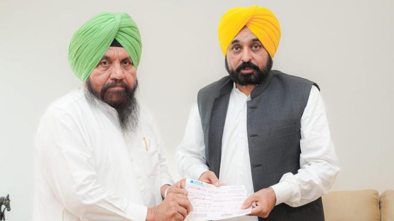 Harchand Singh Burst gave one month's salary for flood relief work Harchand Singh Burst gave one month's salary for flood relief work