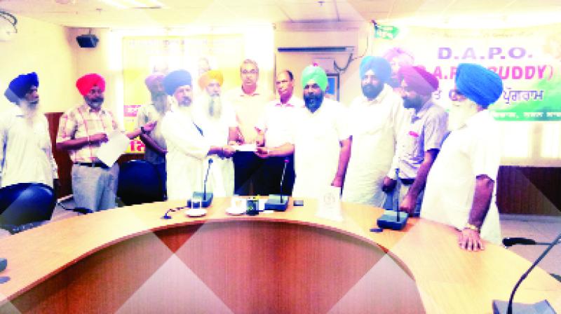 Dharambir Agnihotri Distributing Cheque Dharambir Agnihotri Distributing Cheque