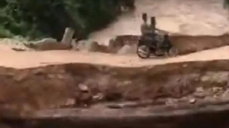 Soldiers plunge into flash flood after bridge collapses terrifying video viral