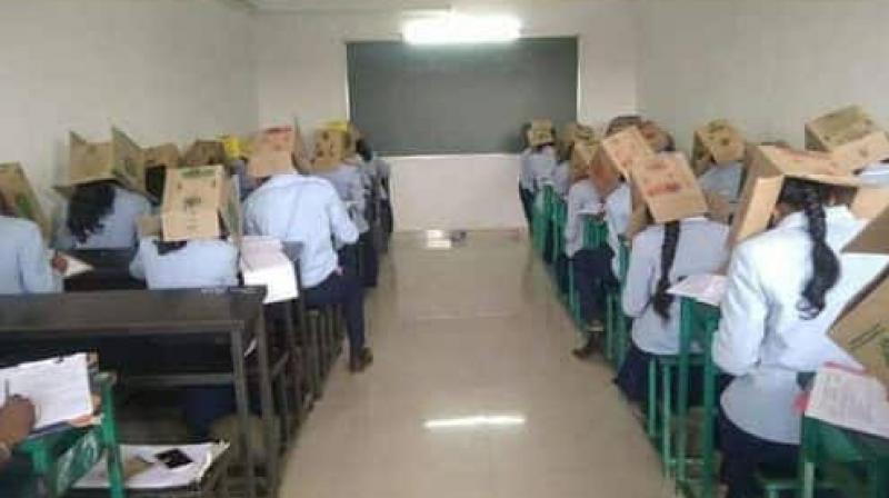 Karnataka Students Made To Wear Cartons To Stop Them From Cheating In Exam Karnataka Students Made To Wear Cartons To Stop Them From Cheating In Exam