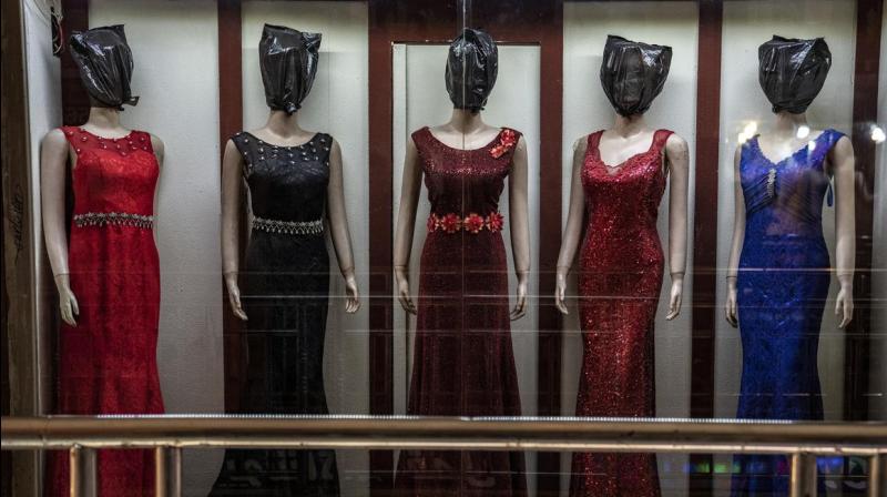 Kabul's mannequins are hooded and masked under Taliban rule Kabul's mannequins are hooded and masked under Taliban rule