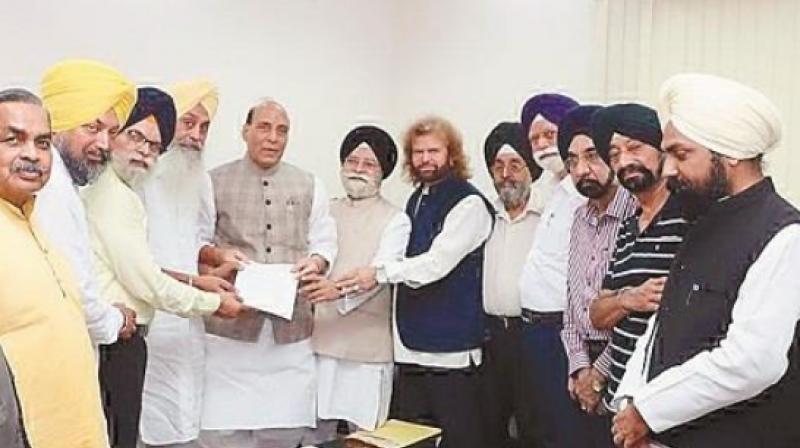 Sikh ministers meet Home Minister Rajnath Singh Sikh ministers meet Home Minister Rajnath Singh