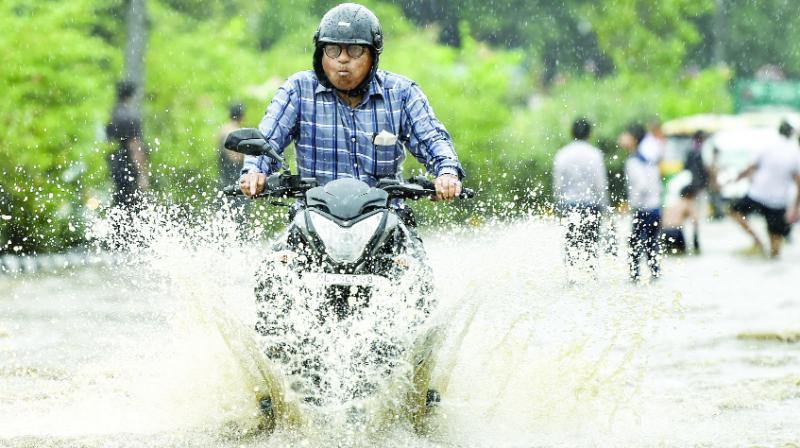 People Passing through standing Water