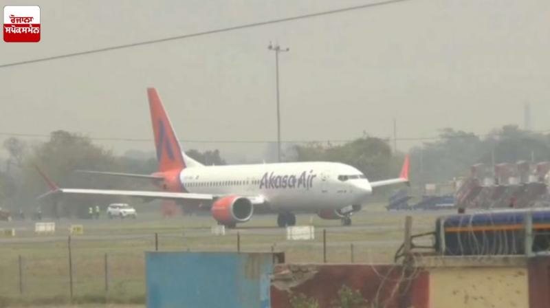 An attempt was made to open the emergency gate of a plane on the runway