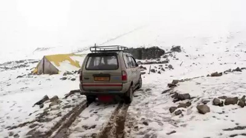 A vehicle plying on snow covered Mughal Road (file photo) A vehicle plying on snow covered Mughal Road (file photo)