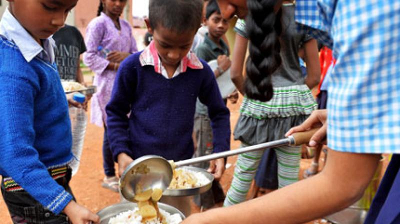 Child daily go to school for mid day meal Child daily go to school for mid day meal