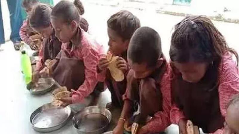 Mid day meal served local journalist who exposed the incident booked for conspiracy Mid day meal served local journalist who exposed the incident booked for conspiracy