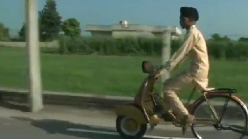 Father and Son made a bicycle that looks like scooter Father and Son made a bicycle that looks like scooter