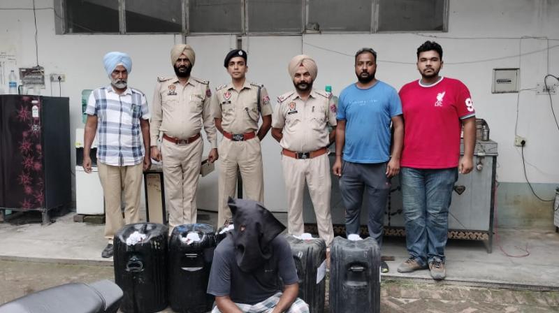 One arrested along with 30 packs of illegal liquor One arrested along with 30 packs of illegal liquor