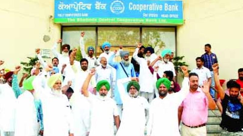 Farmers Protesting in front of bank Farmers Protesting in front of bank