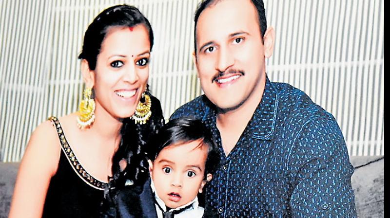 Siddharth Vashisht with his wife and son