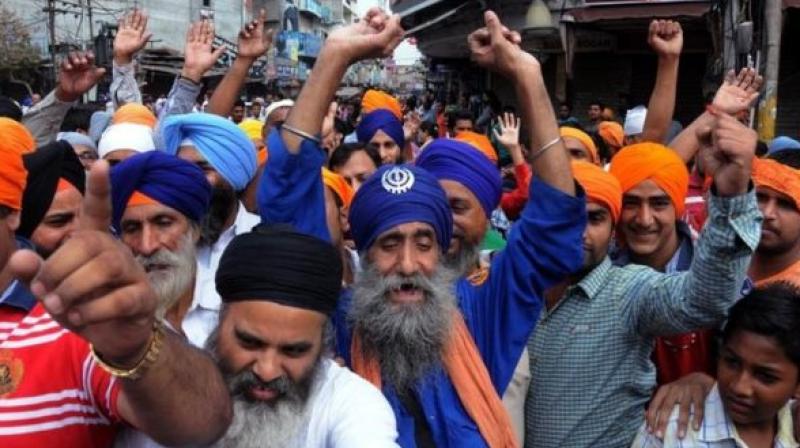 Sikh driver beaten by police