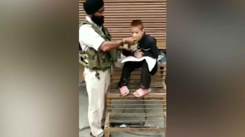 Crpf jawan and kashmiri child