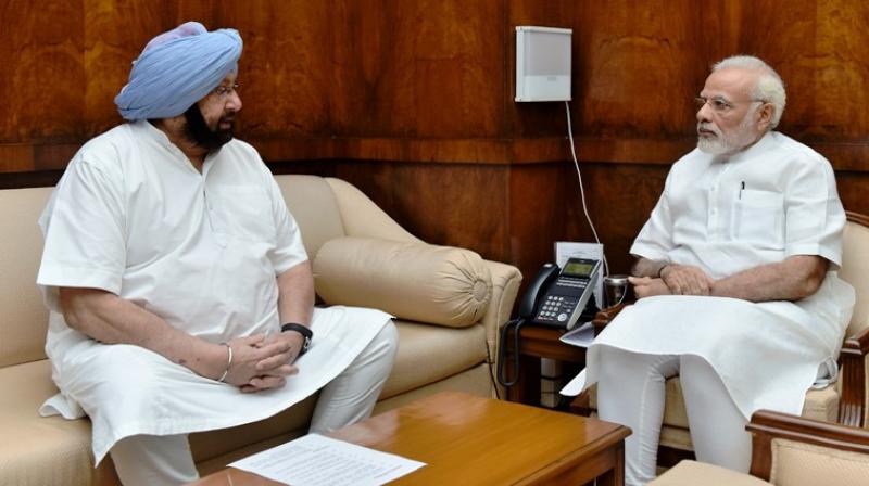 Captain Amarinder Singh and PM Modi Captain Amarinder Singh and PM Modi