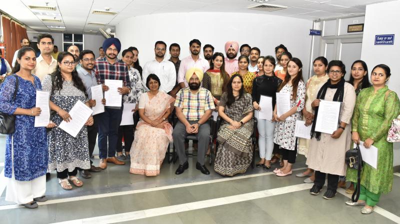 Sarkaria hands over appointment letters to assitant town planners and planning officers Sarkaria hands over appointment letters to assitant town planners and planning officers