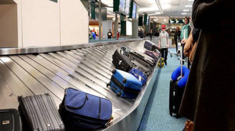 Woman boards luggage belt assuming it will take her to plane Woman boards luggage belt assuming it will take her to plane