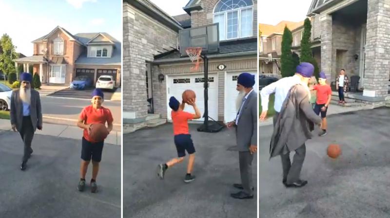 10 year old child and his grandfather playing basketball
