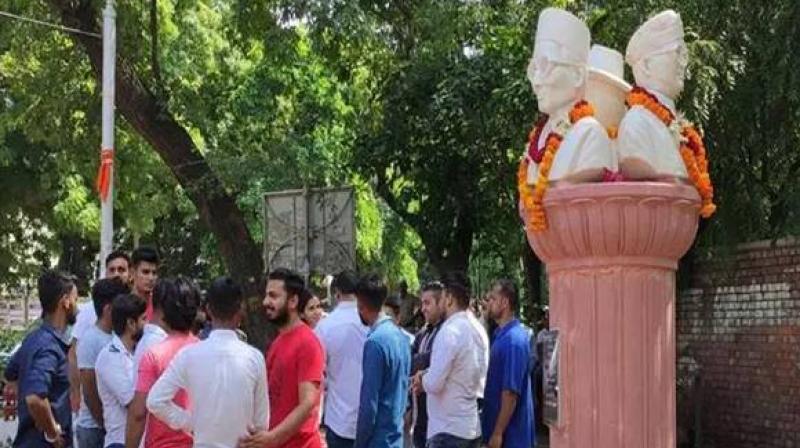 NSUI blackens Veer Savarkar’s bust installed at Delhi University