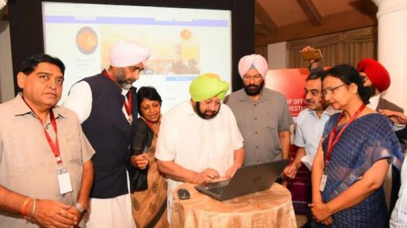 Amarinder launches website, mobile app for 550th birth anniversary of Guru Nanak Dev Amarinder launches website, mobile app for 550th birth anniversary of Guru Nanak Dev