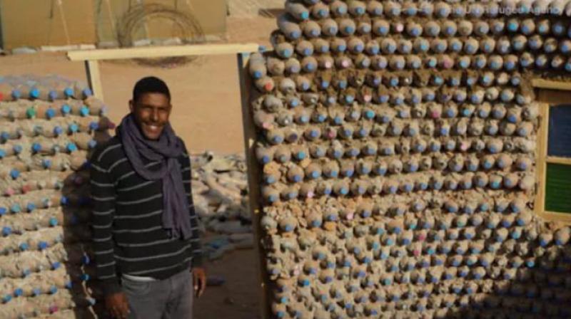 This Refugee Builds Homes Out Of Recycled Plastic Bottles This Refugee Builds Homes Out Of Recycled Plastic Bottles