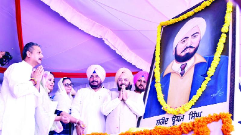 Paying homage to Sadhu Singh Dharamsot  and other martyr Udham Singh