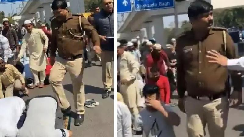Delhi cop suspended for 'kicking' man offering Namaz Delhi cop suspended for 'kicking' man offering Namaz