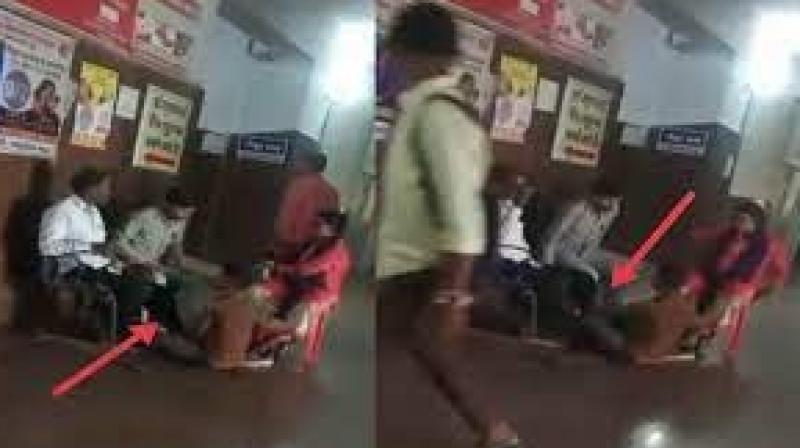A video of a government employee massaging a child has gone viral, a show cause notice has been issued A video of a government employee massaging a child has gone viral, a show cause notice has been issued