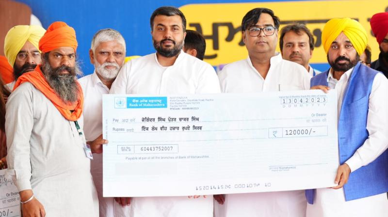 CM Bhagwant Mann hand over compensation cheques at Abohar CM Bhagwant Mann hand over compensation cheques at Abohar