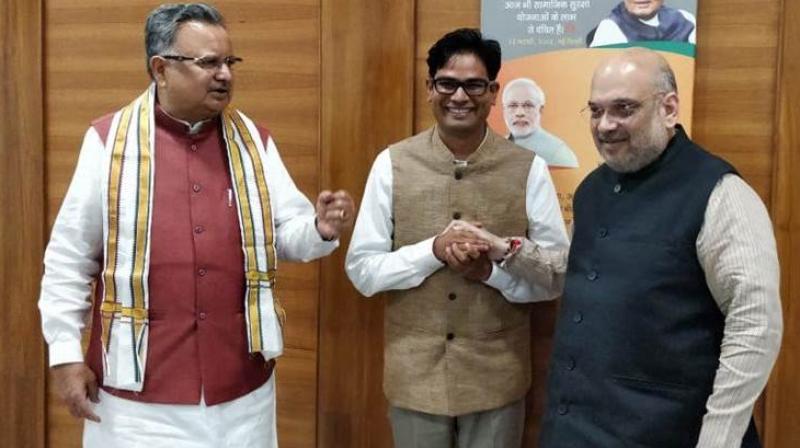 CM Raman Singh, OP Chaudhry and Amit Shah