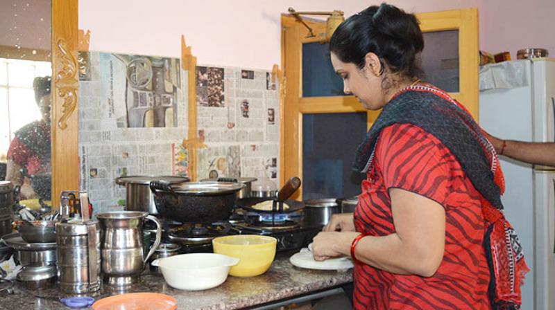 Women working in Kitchen Women working in Kitchen