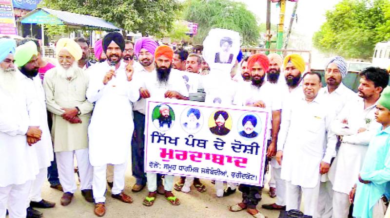 People protesting against the Badals And Sauda Sadh