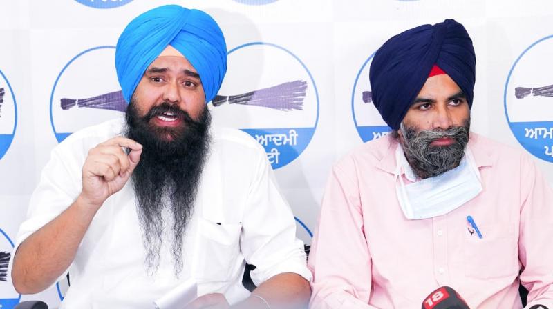 Malwinder Singh Kang and Dr. Sunny Ahluwalia Malwinder Singh Kang and Dr. Sunny Ahluwalia