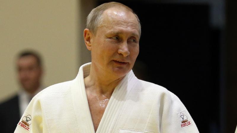 International Judo Federation suspends Vladimir Putin as honorary president