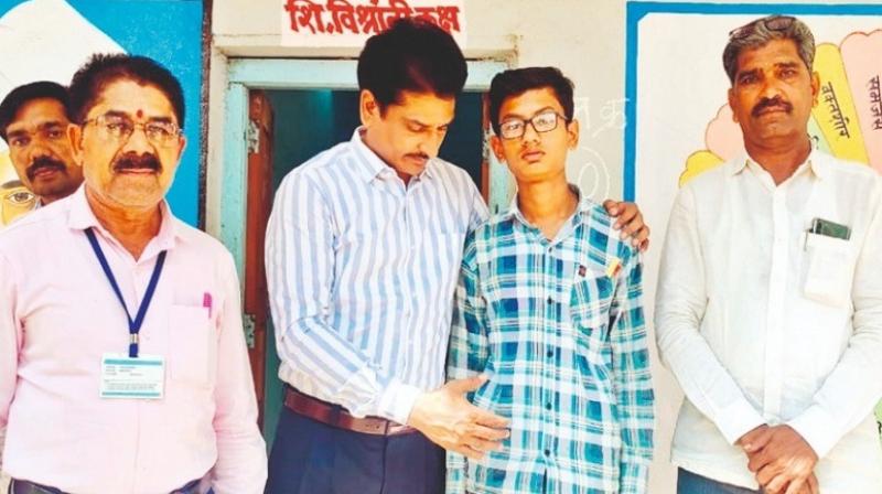 Boy appears for SSC exam hours after performing father's last rites in Latur Boy appears for SSC exam hours after performing father's last rites in Latur