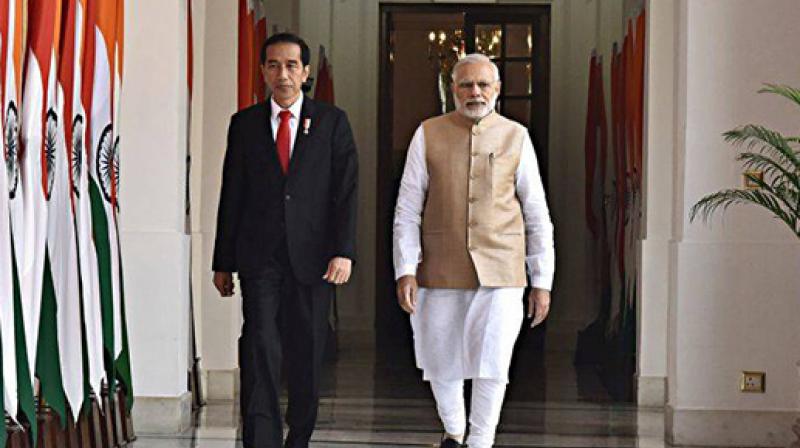 Indonesian President Joko Widodo & PM Narendra Modi Indonesian President Joko Widodo & PM Narendra Modi