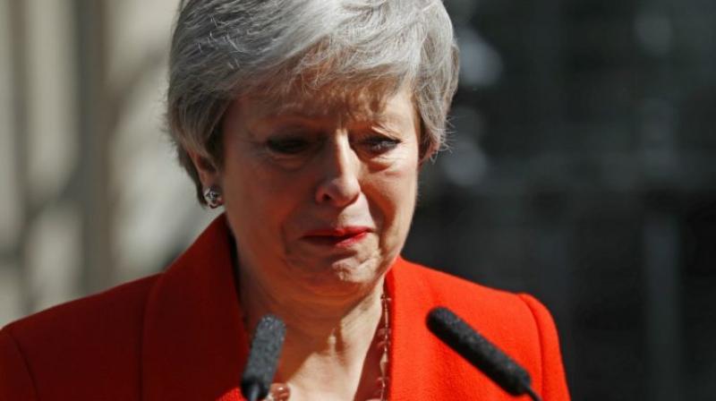 Theresa May resigns as Conservative leader