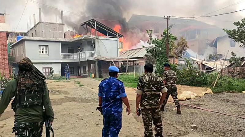 Two houses torched in fresh violence in Manipur; curfew reimposed Two houses torched in fresh violence in Manipur; curfew reimposed