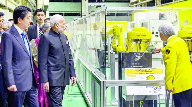 While visiting the industrial robot factory While visiting the industrial robot factory