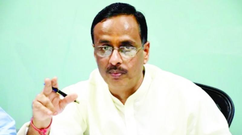 Dr. Dinesh Sharma Dr. Dinesh Sharma
