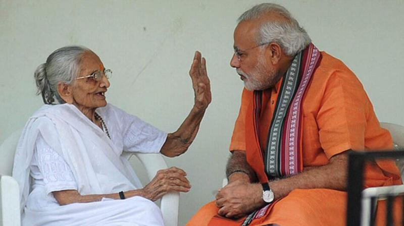 PM Modi With His Mother (File Photo) PM Modi With His Mother (File Photo)